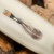 Жулан (Mercorne белый, перо, мозаичные пины, ножны люкс) дамасская сталь ZDI-1016, узор пирамида NEW - Компания «АиР»