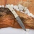 Снегирь (Mercorne белый, крючок, мозаичные пины, ножны люкс) дамасская сталь ZDI-1016, узор пирамида NEW  - Компания «АиР»